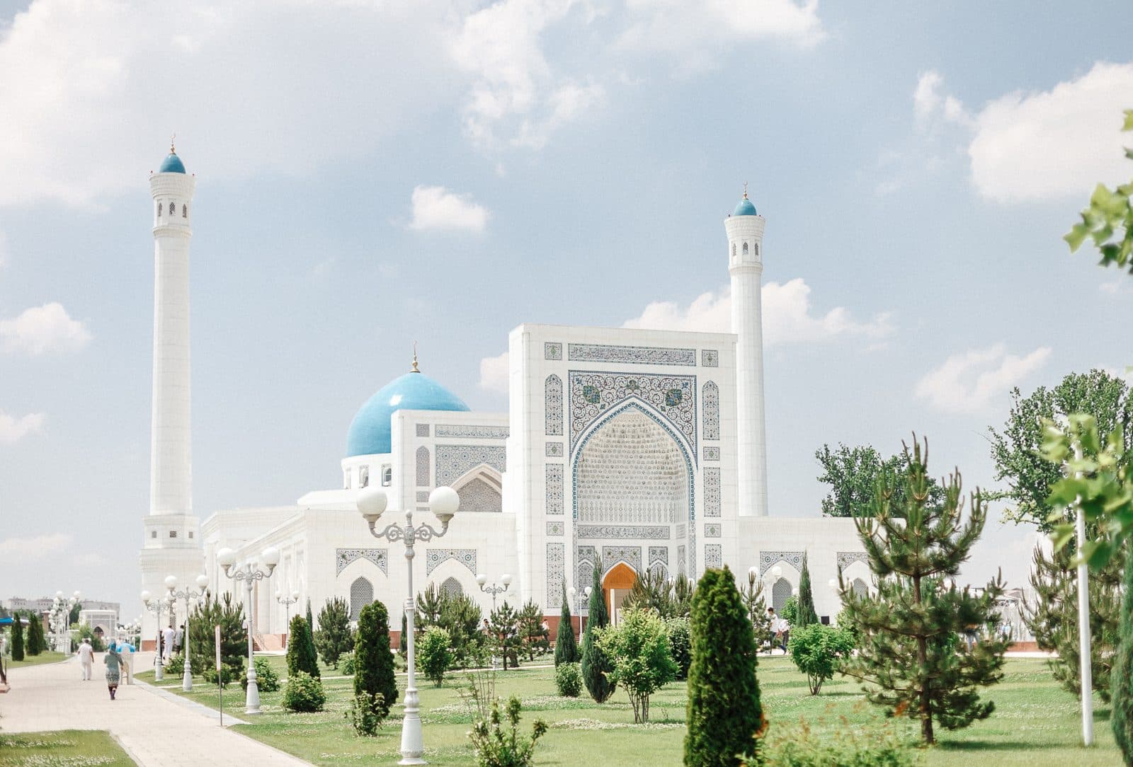 Minor Mosque: white building, sky-blue dome and two minarets